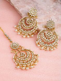 Shipping by UPS Courier with tracking Delivery within 10-12 days Crescent Shaped Chandbalis Gold-toned has kundan and pearls Secured with a post and back This is a handmade item made by skilled women crafters from India Material- Copper Stunning Gold Plated Dangle And Drop Pearls Earrings Nickel and Lead Free Length of the earrings 9.5 Cm Closure Post and Back Occasion Ethnic Indian Wedding Jewelry Sets, Indian Bridal Jewelry Sets, Indian Jewelry Earrings, Bridal Jewelry Vintage, Jewelry Set Design, Kundan Jewelry, Indian Bridal Jewelry, Indian Jewellery Design Earrings, Traditional Earrings