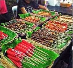 many different types of food are on sticks