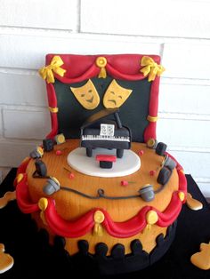 a cake that has been decorated to look like a musical instrument on top of a table