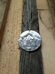 "Each pendant is hand crafted from substantial pieces of sterling silver. The texture is unique in each and every necklace. It will look a lot like the image above, but not exactly. This piece was inspired by mountain biking in California in the Sierra Nevada Mountain Range. Absolutely beautiful! If you're interested in your necklace having a particular Mountain Range, let me know! They're all made custom. The pendant dangles from a durable lovely rolo chain and lobster claw closure and can be m Mt Whitney, Metal Stamping Ideas, Sierra Nevada Mountains, Nature Necklace, Stamping Ideas, Sierra Nevada, Rolo Chain, Mountain Range, Metal Stamping