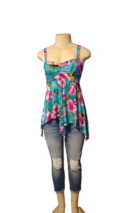 Blue Floral Babydoll Tank Top - The Fix Clothing Fitted Tropical Floral Print Top, Purple Floral Print Summer Tank Top, Summer Purple Floral Print Tank Top, Purple Tank Top For Vacation, Turquoise Floral Print Top For Spring, Blue Floral Print Tank Top For Beach, Floral Print Stretch Tops For Vacation, Blue Floral Print Beach Tank Top, Blue Floral Print Tops For Beach Season