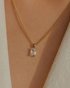 Simple, graceful, and minimalistic, this piece features a rectangular clear crystal CZ stone suspended on the daintiest gold chain. Made with 100% gold-filled materials, she is truly an everyday necklace that you can wear whenever and wherever your heard desires — even in the shower. …………………………………. D E T A I L S • Pendant measures 5 x 13 mm • Tarnish-resistant, waterproof, safe for sensitive skin • 1.5mm width curb chain with spring clasp • 100% 18k gold-filled Soft Toothbrush, Everyday Necklace, Sparkling Crystal, Gold Filled Jewelry, Curb Chain, Cz Stone, Gold Plated Jewelry, Jewelry Plate, Clear Crystal