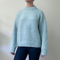 New With Tags, H&M Cozy And Warm Light Blue Mock Turtleneck Oversized Sweater. 90% Recycled Polyester, 5% Wool, 3% Alpaca, 2% Elastane Tag Reads Small, But Could Easily Fit A Medium. Machine Wash Cold, Gentle Cycle Bust: 47" Waist: 45" Length: 23" Sleeve (Pit To Wrist): 18" Blue Sweater With Ribbed Cuffs For Everyday, Blue Sweater With Ribbed Cuffs, Blue Relaxed Fit Sweater For Everyday, Casual Blue High Neck Sweater, Blue Sweater With Ribbed Collar For Layering, Blue Funnel Neck Sweater With Ribbed Cuffs, Casual Oversized Sweater By H&m, H&m Casual Oversized Sweater, Blue Everyday Sweater