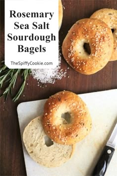 rosemary sea salt sourdough bagels on a cutting board