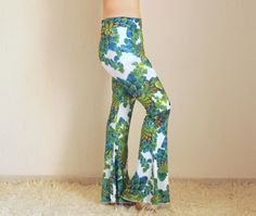 "Green floral bell bottoms women Boho adorable stretchy so comfortable women bell bottoms. You can wear this floral cute leggings for the Festival,Activity,Party,Also you can wear to go to Clubs etc... If you would like to feel the 70s clothing style this stretchy unique bell bottoms is just for you. Choose your size.This floral boho bell bottoms made by stretchy jersey and avaliable plus size XXL.. SIZE CHART; Extra Small (US 0-2) (AU 6 ) (UK 6) Waist: 26\" In seam:31\" Out seam:46\" Leg openin 70s Clothing Style, 70s Style Clothing, Boho Bell Bottoms, Hippie Women, 70s Clothing, Festival Pants, Buy Clothes Online, Pant Women, Flare Pant