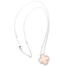 Van Cleef & Arpels Alhambra 18k White Gold Pink Opal Pendant Necklace       Metal: 18k white gold  Length: 16.75", 15"  Weight: 5.5 grams  Stones: 1 alhambra shape pink opal 15mm  Hallmarks: VCA 750 BL68XXX(serial number omitted)  Please reference the dimensions in the description for the best approximate dimensions. Luxury Hallmarked Rose Gold Diamond Necklace, Luxury Pink Diamond Necklace, Luxury White Diamond Necklace With Flower Pendant, Luxury Hallmarked White Gold Diamond Necklace, Luxury White Diamond Necklace With Polished Finish, Hallmarked White Gold Flower Pendant Necklace, Luxury White Diamond Clavicle Necklace, Luxury White Diamond Necklace With Clavicle Chain, Luxury White Necklace With Silver Chain