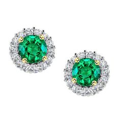 METAL SPECIFICATIONS Two Tone Gold 14K STONE SPECIFICATIONS Stone Name : Green Emerald and Diamond Stone Cut : Round Cut Stone Details : There is one round cut green emerald stone in the center approx. 1.50 carats (Approx. Dia. 6.5 mm) with approx. 0.50 carats of round diamonds on the sides in each earring. Crafted with natural earth mined stones. Color : Green/F Clarity : VS1 Quality : AAA Total : Approx. 4 Carats EARRING SPECIFICATIONS Overall Diameter : Approx. 3/8 Inches (10 mm) Appraised Value : $7,848.00 Comes with Certificate Luxury Green Diamond Earrings With Halo Design, Classic Green Gia Certified Diamond Earrings, Classic Gia Certified Green Diamond Earrings, Elegant Green Diamond Earrings With Brilliant Cut, Green Oval Diamond Earrings For Wedding, Green Halo Jewelry With Round Cut, Green Halo Round Cut Jewelry, Green Round Earrings For May Birthstone, Green Earrings For May Birthstone