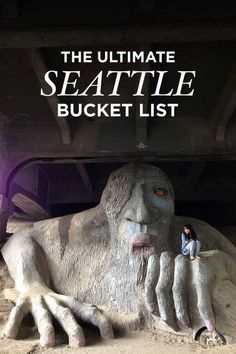 the ultimate seattle bucketet list is in front of a statue of a giant creature