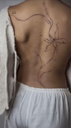 the back of a woman's body with lines drawn on it