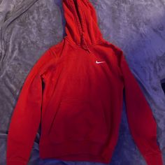 Never Worn Red Nike Hoodie Cheap Red Nike T-shirt, Red Fleece Hoodie With Double-lined Hood, Red Hooded Hoodie With Double-lined Hood, Nike Tops With Adjustable Hood For Fall, Nike Top With Adjustable Hood For Fall, Red Double-lined Hoodie, Nike Red Casual Hoodie, Nike Red Fleece Hoodie, Nike Crew Neck Hoodie For Winter