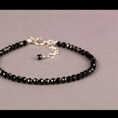 This Fabulous Black Spinel Bracelet Is Handmade With 3.25mm Beautiful Faceted Black Spinel Round Faceted Beads That Are So Sparkly. It Is Available In 925 Sterling Silver, 6.5”Inches Beaded Bracelet With A Spring Ring Clasp And A (1") Extension Chain. If You Do Not Want The Extension Chain, Please Let Me Know . A Perfect Gift For Birthdays, Christmas, Valentine's Day, Mother's Day, Teachers, A Hostess! Great For Everyday Wear And Evenings Too! Solo Or Stacked With Other Bijoux Orion Bracelets, S Black Spinel Bracelet, Sparkly Bracelets, Black Beaded Bracelets, Crystal Beads Bracelet, Black Spinel, Nature Bracelets, Black Crystals, Adjustable Bracelet, Faceted Bead