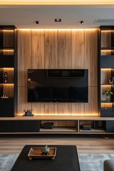 modern living room with built - in entertainment center and large screen tv on the wall