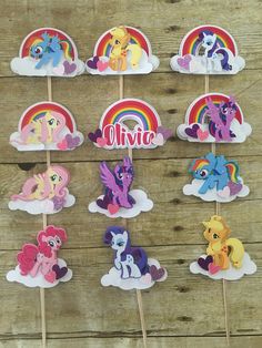 my little pony birthday party cupcake toppers with rainbows and ponies on them