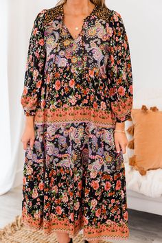 Embrace a sense of effortless elegance in this midi dress! The flowy black ruffled baby doll silhouette and vibrant orange and purple abstract floral and paisley pattern create a striking combination! With a romantic v-neckline and long-sleeves, this dress exudes sophistication and grace! Self - 100% Polyester Contrast - 100% Rayon Doll Silhouette, Midi Dress Black, Purple Abstract, Tunic Sweatshirt, Jumpsuit Party, Effortless Elegance, Black Ruffle, Skirt Leggings, Dress With Cardigan