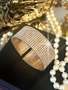 BELLA-TIARA'S BRIDAL ROYAL JEWELRY COLLECTION A BELLA-TIARA'S FAVORITE Gorgeous, elegant and glamorous wide Swarovski crystal gold cuff bracelet. Design with crystal all around the perfect fit approx 2." wide and 7" round suitable for average wrist. *Note processing time is not shipping time, our regular Free shipping takes approx. 5-6 days to receive after shipped. With rush processing your order is expedited and you will also be upgraded to priority mail approx 2-3 days to arrive once shippedE Swarovski Tiara, Crystal Purse, Wedding Hair Headband, Wedding Necklace Set, Crystal Cuff Bracelet, Gold Cuff Bracelet, Gold Bracelet Cuff, Gold Cuffs, Wedding Headband