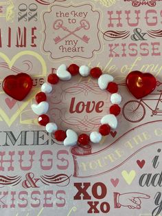 This is a Valentine heart bracelet. It would make a cute gift for a little girl for Valentines Day. It would make a cute addition to a little girl's Valentine outfit. It has five white heart pony beads. It has solid white and red 8mm faceted beads. It was made with .8mm sturdy stretch sting. I tie it several times to prevent breakage. It fits girls ages 5-8. It stretches to fit on the wrist. All items are ready to be shipped I do combined shipping. Items ship in 2-5 business days. Check out more Gifts Bracelets, Girls Valentines Outfit, Girls Bracelets, Gifts For Valentines, Bracelets For Kids, Bracelets For Girls, Letter Bead Bracelets, Candy Bracelet, Bracelet Heart