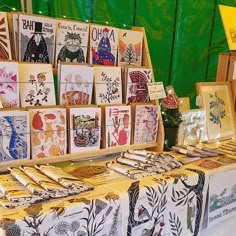 many cards are on display at an outdoor market