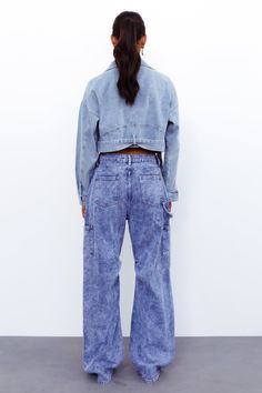 Length from shoulder to hem of size S: 46cm.鈥/li>Denim cropped jacket. Cold hand wash only. Model is a standard S and is wearing S. True to size. Mid-weight and non-stretchy, soft material. Zip closure. Cotton/Polyester. Need the perfect way to cap off your 'fit Try out the Aine Cropped Jacket which features long sleeves with a button closure, collars, a waist belt and a zip-up closure. Style yours with your fave midi dress and sneakers. Denim Cropped Jacket With Pockets, Streetwear Cropped Jacket With Pockets, Cropped Streetwear Jacket With Pockets, Trendy Cropped Jacket With Flap Pockets, Spring Streetwear Denim Jacket With Cargo Pockets, Cropped Jacket With Pockets For Summer, Summer Cropped Jacket With Pockets, Cropped Summer Jacket With Pockets, Denim Blue Cropped Cotton Jacket