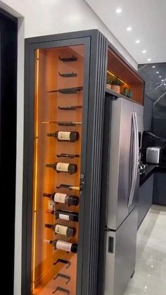 a wine cooler with many bottles in it