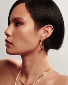 Lucy Williams Entwine Hoop Earrings 18ct Gold Plated. Your Ear Stack, Upgraded. These Lucy Williams X Missoma Best Sellers are Are Everything We Love about Vintage-Inspired Hoops, Featuring a Unique Crossover Design. Pair with an Ear Cuff for Retro Styling. Metal: 18Ct Gold Plated on Brass Dimensions: 35mm Hoops; Width 6mm Weight: 27. 5g Pair Product Code: Lws-G-E4-Ns Gold Plated Hoop Fine Jewelry, Classic Single Small Hoop Earring, Elegant Gold Plated Hoop Huggie Earrings, Luxury Gold-plated Tarnish-resistant Hoop Earrings, Luxury Gold Plated Tarnish Resistant Hoop Earrings, Timeless Gold-plated Hoop Jewelry, Elegant Yellow Gold Tarnish-resistant Hoop Earrings, White Gold-plated Hoop Earrings, Classic Everyday Hoop Earrings With Plating