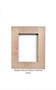 the maple wood glass cabinet door is shown with an open white window in the center