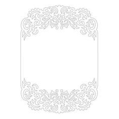 a paper cutout with an ornate design on the front and back side, in white