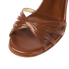 Nadine in toffee is a showstopper worthy of your attention. Designed and made in Italy, this classic style has multi-band strap across the toes and a slim sandal back. The front straps design can accommodate wider feet, or bunions if needed. The shoe is finished with a subtle signature brilliant adornment on the left heel. With a soft gel padding, you are comfortable from the very first wear. Leather construction with leather lining & sole Wraparound fastening, can be worn around ankle or under Fitted Slingback Sandals With Heel And Single Toe Strap, Classic Ankle Strap Kitten Heels With Padded Heel, Evening Open Heel Kitten Heels With Penny Strap, Evening Kitten Heels With Penny Strap And Open Heel, Classic Open Heel Kitten Heels With Leather Sole, Classic Kitten Heels With Open Heel And Leather Sole, Classic Kitten Heels With Leather Sole And Open Heel, Classic Kitten Heels For Party, Classic Ankle Strap Kitten Heels With Heel Loop