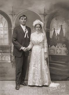 an old photo of a bride and groom