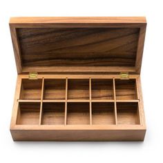 an open wooden box with compartments on the inside