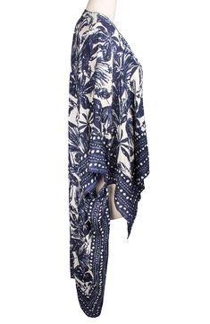 Whether you're going for a stroll under the sun or out for an evening, this ultra lightweight duster will radiate opulence. 26" L x 51" W Open front 3/4 length sleeves
 Side vents All-over print Woven 100% rayon Hand wash cold, line dry Imported Model stats: 5'10", 32" bust, 25" waist, 36" hip. Summer Outerwear With 3/4 Sleeves, Long Summer Beach Outerwear, Long Sleeve Summer Kimono For Daywear, Chic Printed Outerwear For Summer, Chic Printed Summer Outerwear, Chic Summer Printed Outerwear, Summer Long Sleeve Kimono For Daywear, Printed Open Front Outerwear For Vacation, White Summer Outerwear With 3/4 Sleeve