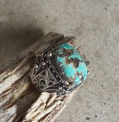 WANTED all over the Universe. Turquoise is recognized Sought After by early KINGS, MOVERS, and SHAKERS! Turquoise is said to be a vessel Imbued with energies associated with Heaven! All My Turquoise is Carefully chosen from around the World. I love the Raw Authentic look and feel of the stone...so I do not over polish the Turquoise! True Bohemian Style...an Original work of Art that you can treasure for a lifetime! Each of My Creations are One of A Kind and are Hand wrought to bring out the best Southwestern Silver Turquoise Ring With Natural Stones, Handmade Southwestern Style Ring Jewelry, Handmade Southwestern Style Ring, Bohemian Turquoise Gemstone Ring, Bohemian Green Turquoise Gemstone Ring, Bohemian Turquoise Jewelry With Patina, Bohemian Green Jewelry With Patina, Bohemian Ring With Large Stone, Bohemian Rings With Large Stone