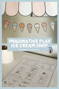 an ice cream shop sign with paper cutouts hanging from it's sides and the words, imaginative play ice cream shop