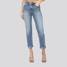 Elevate your street trend game with these slender light-wash jeans from the 2024 Summer Collection. Crafted to perfection, these vintage-inspired jeans boast a frayed and cutoff-bottom design that exudes effortless cool. The high-waist fit and stretchy fabric hug your curves for a flattering silhouette, while the zipper and button closure add a touch of sophistication.Distinctive Features: Street Style: These jeans are the perfect embodiment of street style, with a touch of vintage charm and con Medium Wash Mom Fit Jeans For Spring, Trendy High Rise Light Wash Jeans, Summer Mom Fit Denim Blue Jeans, Trendy Mid-rise Washed Blue Cropped Jeans, Denim Blue Mom Fit Jeans For Summer, Trendy Mom Fit Denim Blue Jeans, Trendy Medium Wash Cropped Leg Jeans, Light Wash Mid-rise Mom Jeans, Trendy Light Wash Straight Leg Jeans