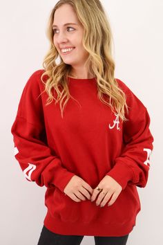 Stay warm and show your pride with our Crimson Alabama Sweatshirt! This standard crew neck sweatshirt features a script A embroidered logo on the front and a large Alabama graphic on the back. Perfect for game days or casual wear, this sweatshirt combines style and team spirit in one cozy package. Roll Tide! Crimson Alabama Sweatshirt Alabama Crimson Tide Sweatshirt Women's Alabama Crimson Tide Sweatshirt Standard crewneck sweatshirt Relaxed fitting Front chest embroidered script A logo Large Al Fall Loungewear, Alabama Sweatshirt, A Script, Roll Tide, Alabama Crimson, Alabama Crimson Tide, Crimson Tide, Short Leggings, Shop Swimwear