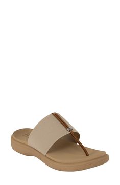 Show off beachy style with this slide sandal featuring a thong toe, comfortable elastic strap and comfortable cushioned footbed. 1" heel Synthetic upper, lining and sole Made in Italy Summer Travel Slip-on Sandals, Beige Synthetic T-strap Sandals For Beach, Synthetic Single Toe Strap Footbed Sandals For Vacation, Synthetic Single Toe Strap Vacation Footbed Sandals, Synthetic Footbed Sandals With Single Toe Strap For Vacation, Beach Footbed Sandals With Toe Post, Synthetic Toe Post Footbed Sandals For Beach, Ortholite Insole Flat Flip Flops For Beach, Summer T-strap Footbed Sandals With Textured Footbed