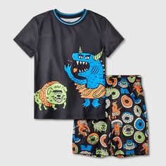 Your child will love catching up on some z's in sweet style with this Short-Sleeve Crew Pajama Set from Cat & Jack™. This pajama set includes a short-sleeve crewneck tee and pull-on pajama shorts, both featuring a fun print and both crafted from 100% recycled polyester knit fabric for all-night comfort. Best of all, the pajama shorts are designed with a full elastic waistband to offer them a secure fit. Cat & Jack™: Designed for all children so you can trust it's made for yours. Casual Bedtime Sets With Character Print, Playful Halloween Sleepwear, Fun Character Print Loungewear Sets, Fun Loungewear Sets With Character Print, Playful Character Print Sleepwear With Short Sleeves, Playful Character Print Sleepwear, Black Cartoon Print Sleepwear For Pajama Party, Fun Cartoon Print Sleepwear For Bedtime, Fun Cartoon Print Sleepwear