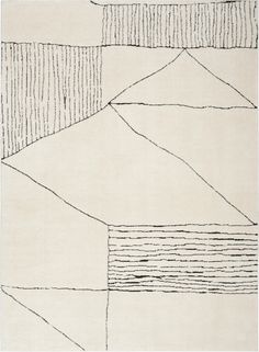 a white rug with black lines on the top and bottom, in an abstract manner