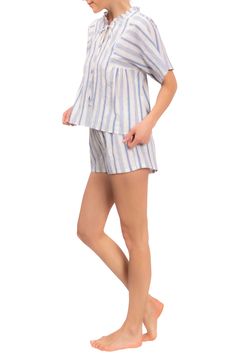 Tonal-striped cotton seersucker keeps you cool on the hottest nights in short pajamas featuring a floaty top trimmed in a mini ruffle. Top has split neck with ties; short sleeves 100% cotton Machine wash, tumble dry Made in the USA of imported fabric Black Owned/Founded Cotton Pajama Shorts, Fall Stripes, Short Pajamas, Tennis Skirts, Striped Pyjamas, Night Suit, Womens Tennis, Fabric Black, Pajama Shorts