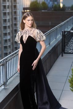 Deep V neck pointed bodice velvet collumn gown with organza train and embroidered tulle puff sleeve