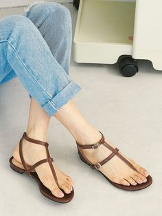 Editor's NotePretty yet comfy sandals will complete your summer look- Gladiator-like strappy sandals- Adjustable fit with the buckles on the straps- The ankle strap secures the feet- Flat design that goes with everything in the summerMeasurement (inch)- KR230(US 6)-KR255(US 8.5)- Height 0.4in.* Fits true to the size* Please refer to the size chartComposition & Care- Goat skin* Deformation or discoloring might happen if in contact with humid air or high temperature* Avoid rain and snow* Comfy Sandals, Cool Shoes, Toe Ring, Toe Rings, Flat Design, Strappy Sandals, Gladiator Sandals, Platform Sandals, Summer Looks