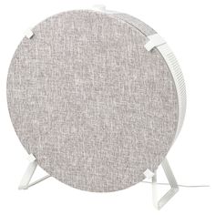 the back side of a round table with white legs