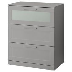 a gray filing cabinet with three drawers