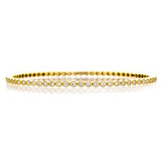 The Bezel White Diamond Bangle is a soft touch to your wardrobe, with repetition of round milgrain-finished bezel settings to keep the sparkle aglow. 18K Yellow Gold 73 Brilliant Cut White Diamonds Total Diamond Weight: 2.65ct Bangle Diameter: 2.5" Classic Round Bangle With Diamond Accents, Classic Bezel Setting Tennis Bangle Bracelet, Luxury Diamond Bracelet With Bezel Setting, Luxury Round Diamond Bracelet With Bezel Setting, Formal Round Diamond Bracelet With Bezel Setting, Luxury Bezel Setting Tennis Bracelet, Formal Round Bracelets With Bezel Setting, Elegant Formal Bangle With Bezel Setting, Classic Formal Bangle With Bezel Setting