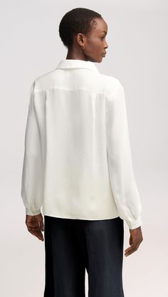 Here’s what happens when an everyday item piece gets an elegant twist. Made of airy Georgette silk, this versatile blouse features bubble sleeves, smart cuffs, and a relaxed fit for effortless layering. Pair with wide-leg trousers, heels, and bold accessories for a classy look that never misses. Elegant Solid Blouse With Blouson Sleeves, Elegant Puff Sleeve Blouse With Cuffed Sleeves, Chic Bishop Sleeve Tops For Daywear, Elegant Blouse With Gathered Balloon Sleeves, Elegant Blouse With Balloon Gathered Sleeves, Formal Silk Top With Balloon Sleeves, Silk Balloon Sleeve Formal Tops, Classic Solid Tops With Blouson Sleeves, Elegant Solid Color Blouse With Bishop Sleeves