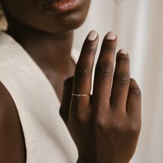 Look at our cutest Tiny Birthstone Ring! The itty bitty gemstone detailing is so subtle, it's almost bold, and will add a gentle birthstone-colored hue to your look for a soft and sweet touch of charm. Material: High-Quality Solid 925 Sterling Silver Finish: Sterling Silver ∙ 18K Gold ∙ Rose Gold Stone Dimensions: 2mm Genuine CZ Gemstone SKU: MM-RM45 Sizing Guide Rings are created true to standard US sizing. For the best fit we suggest having your finger(s) sized. We offer a physical ring sizer Sterling Silver Birthstone Ring, Birthstone Stacking Rings, Ring Birthstone, Minimalist Ring, Ring Sizer, Jewelry Photography, Perfect Gift For Mom, Anklet Jewelry, Ring Gemstone