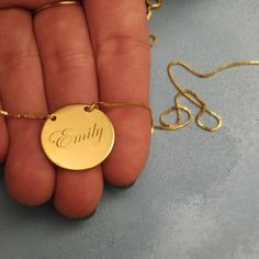 14k Solid Gold - Personalized Name - Engraved Necklace - Gold Round Necklace - Engraved Nameplate - 14k Name Necklace - 14k Solid Gold Name . . . . . . . . . . . . . . . . . . . . . . . . . . . . . . . . . . . . . . . . . . . . . . . . . . . . . . . . . . . . Looking for a thoughtful gift for your loved one? You will love this high quality 14k solid gold round name necklace. This is a perfect gift for your girlfriend or wife. Personalize it with her name in a beautiful font. This lovely solid go Silver Nameplate Necklace Stamped 14k, Etched 14k Rose Gold Jewelry, Etched Rose Gold Jewelry In 14k Gold, Yellow Gold Medallion Necklaces With Engraving Option, Yellow Gold Medallion Necklace With Engraving Option, Custom Engraved Gold Plated Nameplate Necklace, 14k Yellow Gold Name Necklace With Round Pendant, 14k Yellow Gold Round Pendant Name Necklace, 14k Gold Jewelry Pendant With Engraving Option