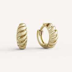 Annie Hoops feature a dome shaped hinged hoop with gold detail and negative space. Modern Small Hoop Hinged Huggie Earrings, Modern Hinged Small Hoop Huggie Earrings, Modern Yellow Gold Hinged Huggie Earrings, Negative Space, Gold Details, Types Of Metal, Yellow Gold, Yellow, Gold