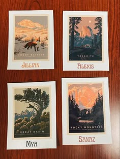 four postcards with different images of mountains and trees in them on a wooden surface