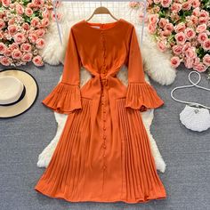 Orange A line long sleeve dress fashion dressFabric: blendedColor: orangeSize(cm): S, M, L, XL, 2XLS length 120 bust 88 waist 70M length 121 bust 92 waist 74L length 122 bust 96 waist 78&ltp&gtXL length 123 bust 100 waist 82&lt/p&gt&ltbr/&gt&ltp&gt2XL length 124 bust 104 waist 86&lt/p&gt&ltbr/&gt Spring Solid Color Long Sleeve Dress, Spring Long Sleeve Dress In Solid Color, Chic Long Sleeve Dress With Bell Sleeves For Fall, Chic Long Sleeve Pleated Evening Dress, Spring Midi Dress With Long Sleeves In Solid Color, Elegant Orange Long Sleeve Maxi Dress, Elegant Long Sleeve Orange Maxi Dress, Chic Long Sleeve Solid Color Midi Dress, Trendy Long Sleeve Fall Dresses