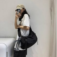 Machine wash and hang dry for optimal quality. Bags For Tomboys, Sling Bag Outfit Korean, Tomboy Bag, Outfit With Sling Bag, Sling Bag Outfit, Slingbag Wanita, Tomboy Outfit, Androgynous Outfits, Pictures People